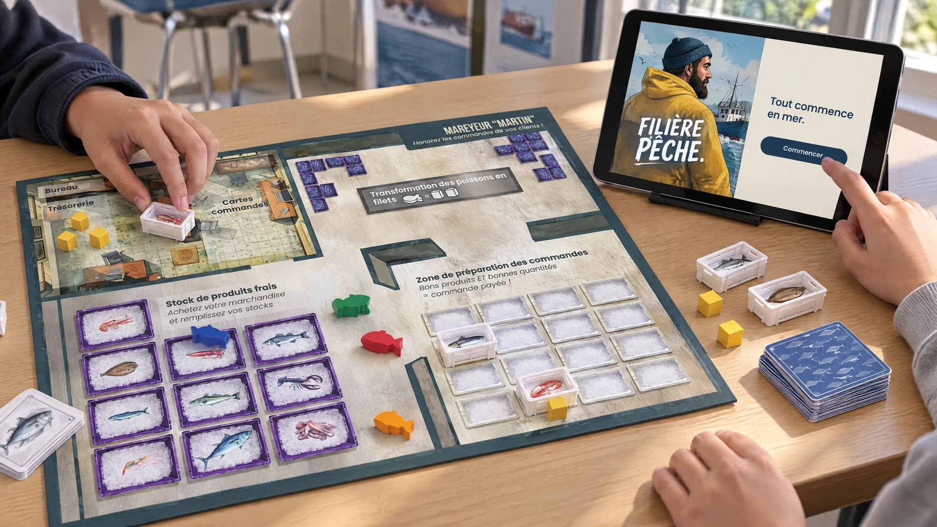 Le plateau du mareyeur et la tablette du jeu sur une table