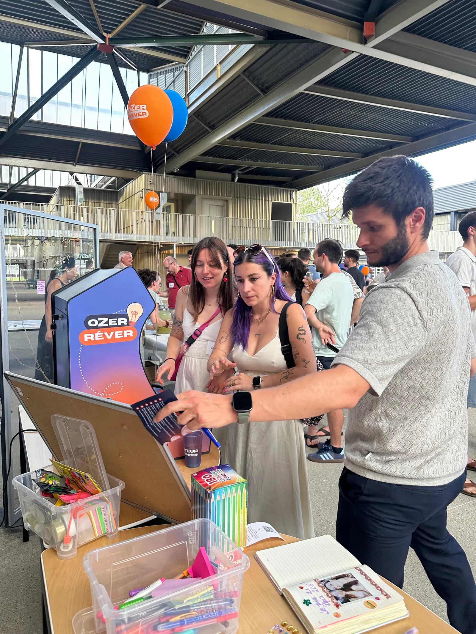 Visitors around the kiosk